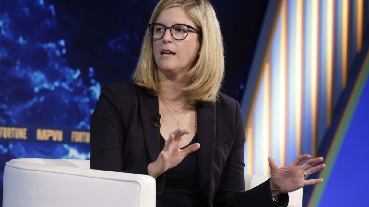 Woman in glasses gestures
