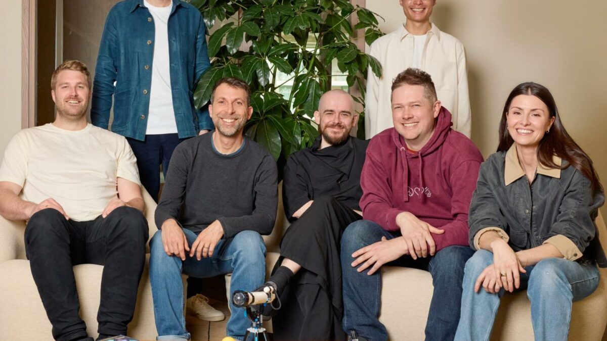 Photo of the seven Ineffable Intelligence cofounders. Back row (standing): Alexandre Laterre and Junyhuk Oh; Seated (from left): Lasse Espeholt, David Silver, Wojciech. Czarnecki, Chris Apps, and Heather Gorham.