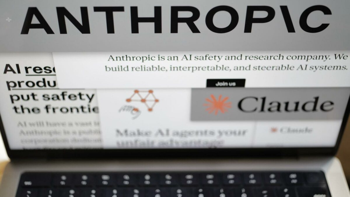 ages from the Anthropic website and the company's logos are displayed on a computer screen in New York on Thursday, Feb. 26, 2026.