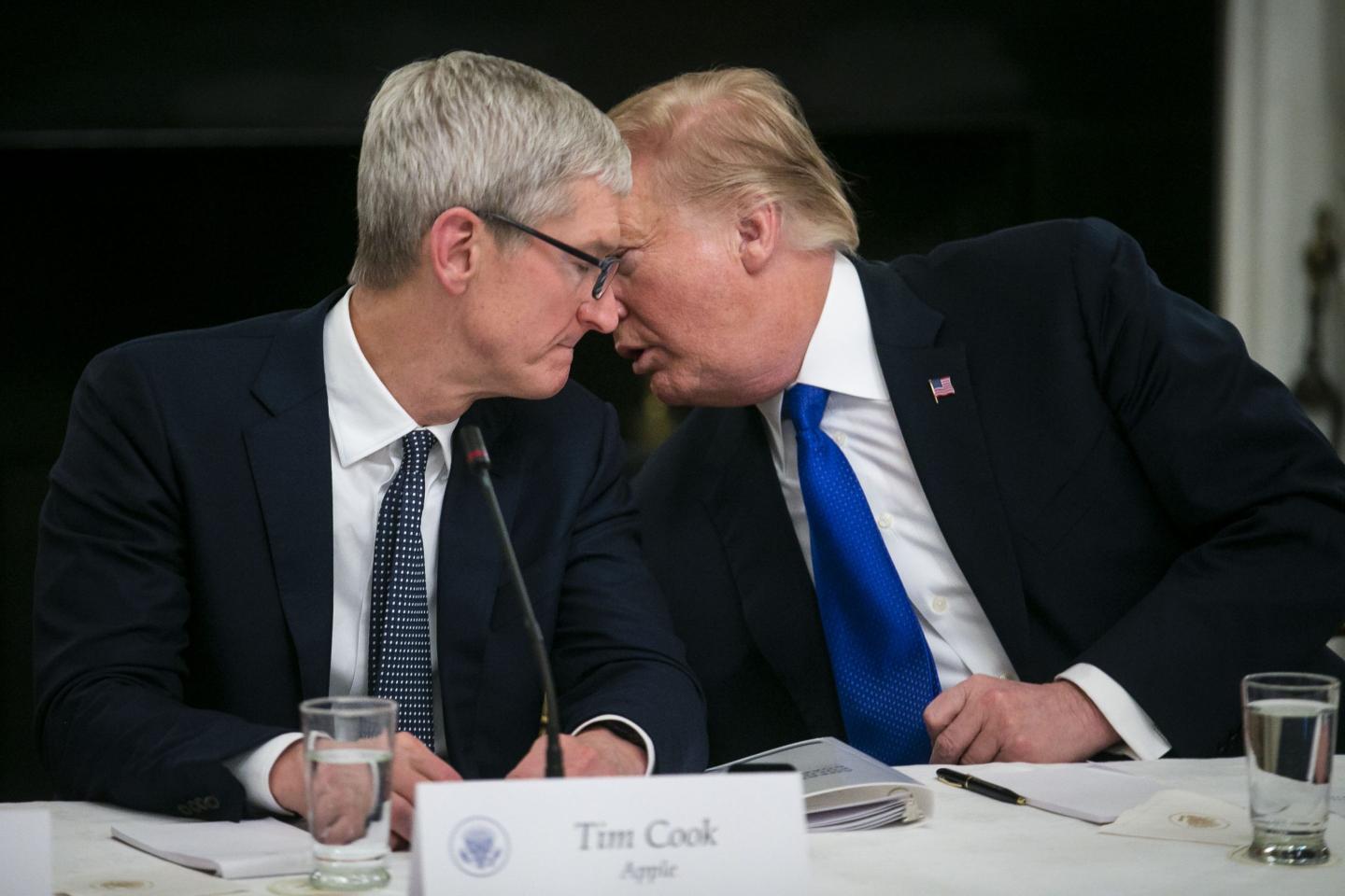 President Donald Trump with then–Apple CEO Tim Cook during a White House meeting in 2019. Cook would go on to earn a fitting nickname for his relationship with the president: “Trump whisperer.”