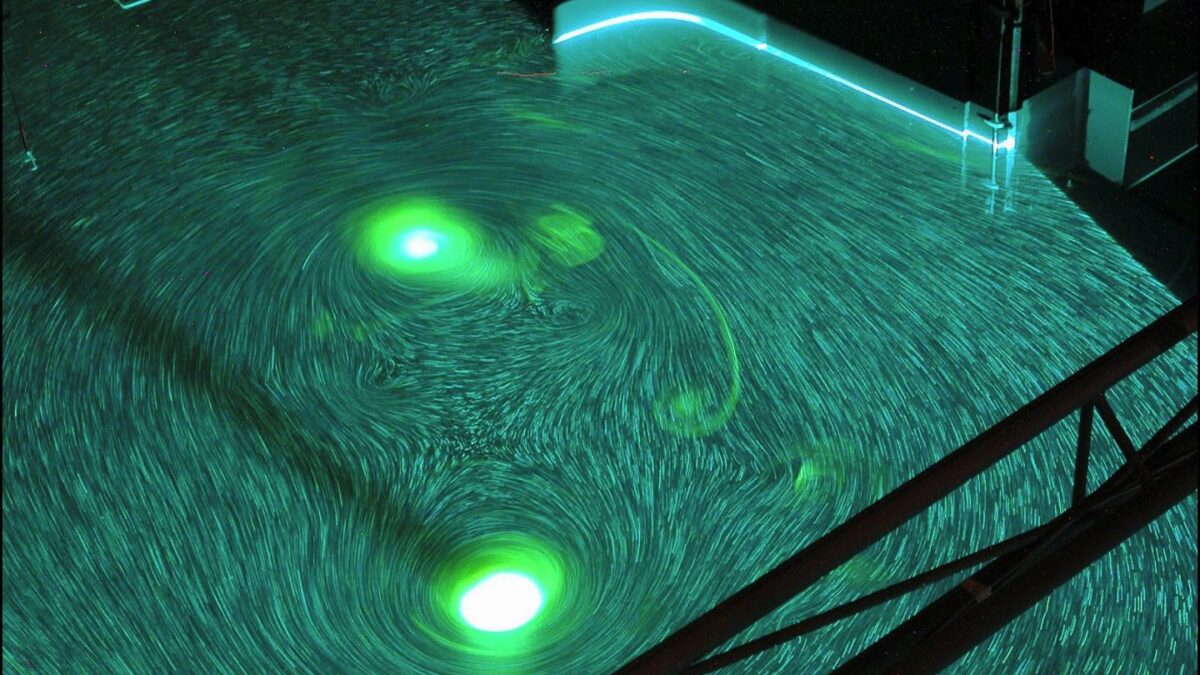 Image of an experiment involving lasers to measure simulated hurricanes.