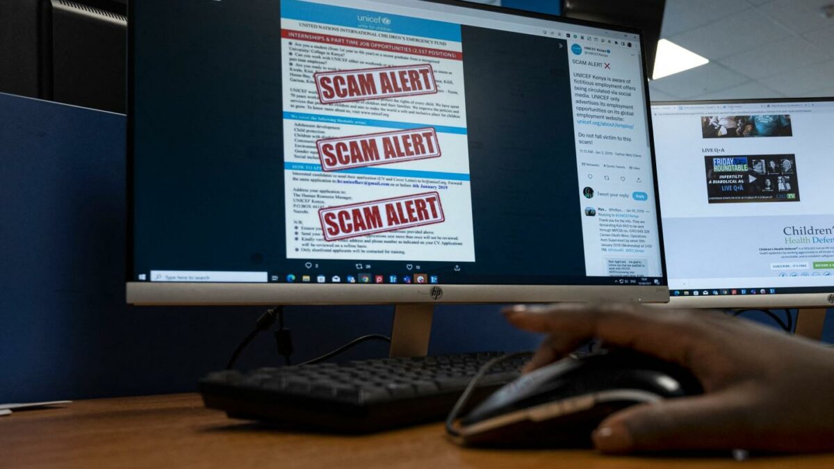 A researcher browses an internet site with a job offer for a United Nations agency that has been flagged as a scam in Nairobi on June 30, 2022. A report by Code for Africa revealed that in 2020 when job losses soared during the Covid-19 pandemic 33 scam recruitment Facebook accounts, groups and pages with more than 184,000 followers targeted people in Kenya, requiring them to send about 350 Kenyan shillings ($3) before placements that never materialised. Syndicates behind these scams rely on the desperation of job seekers who fail to double-check the authenticity of job postings and send money without hesitation to secure employment, said Kenyan cyber security expert Anthony Muiyuro.