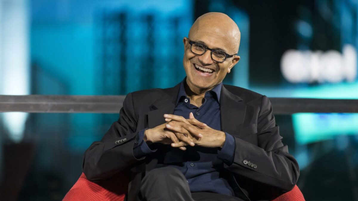 Microsoft CEO Satya Nadella smiling on stage