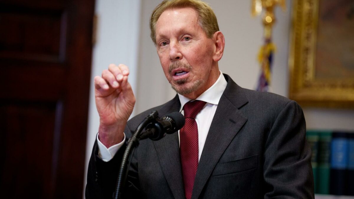 Man at a podium in a suit