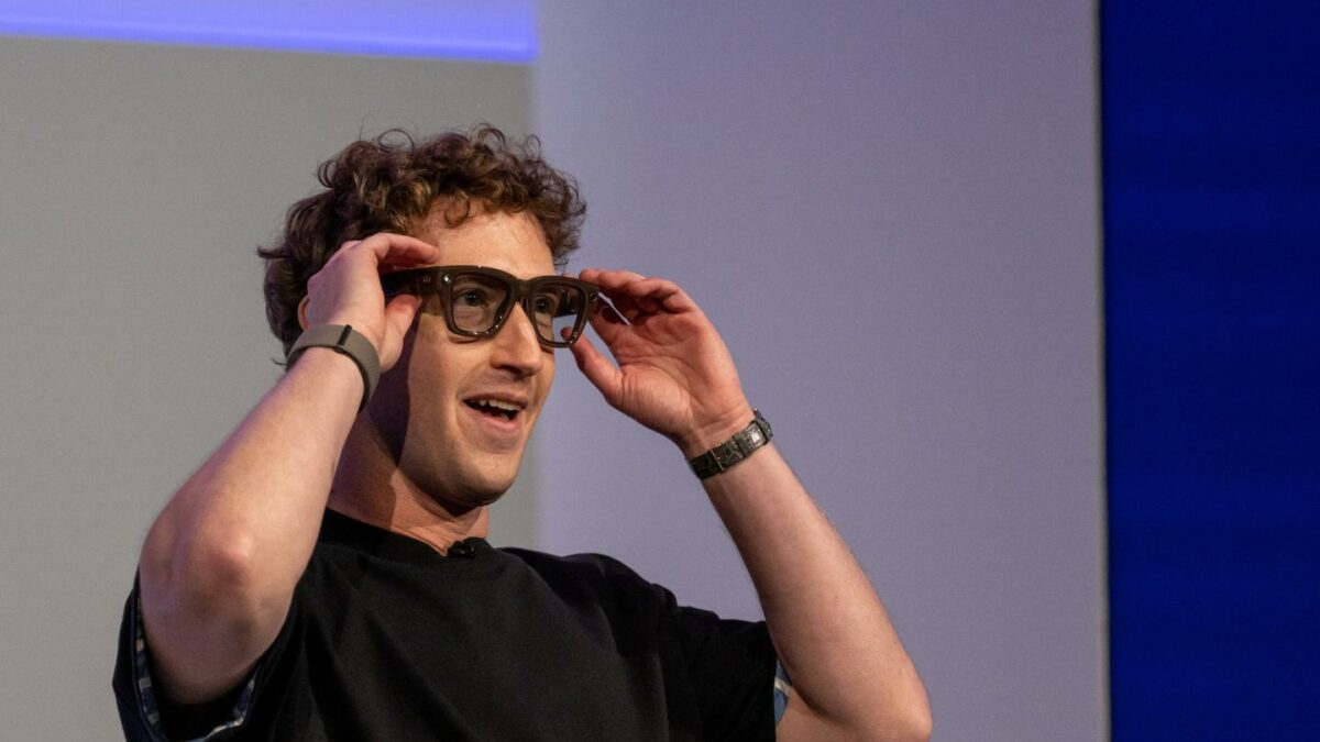 Mark Zuckerberg, chief executive officer of Meta Platforms Inc., wears a pair of Meta Ray-Ban Display AI glasses during the Meta Connect event.