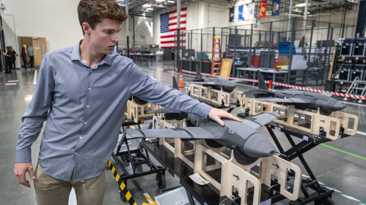 Ethan Thornton views production of the Glide, a high-altitude glider.