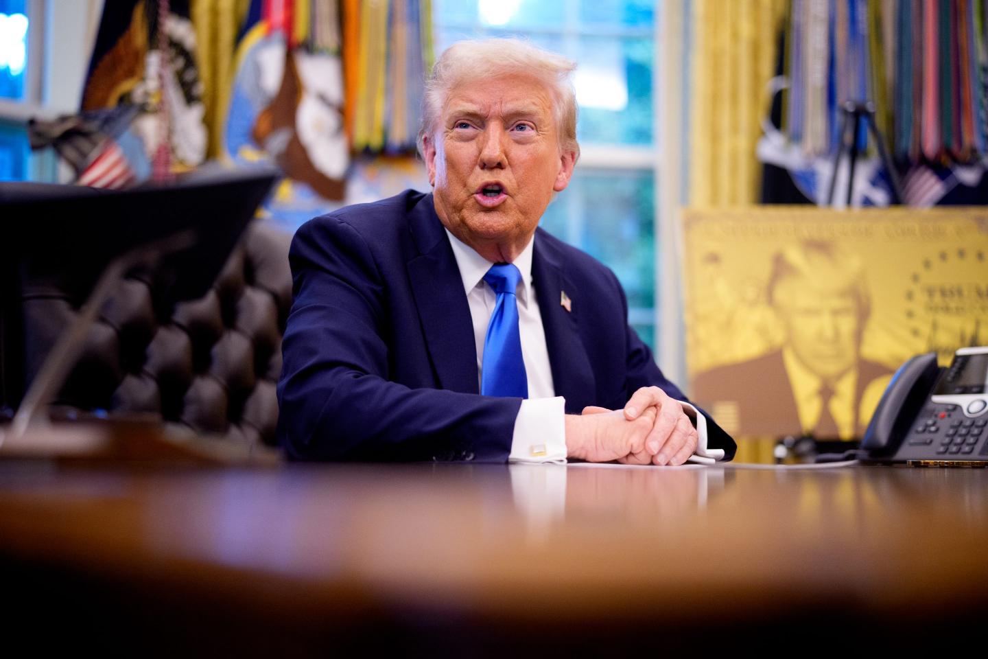 Photo of Trump at his desk