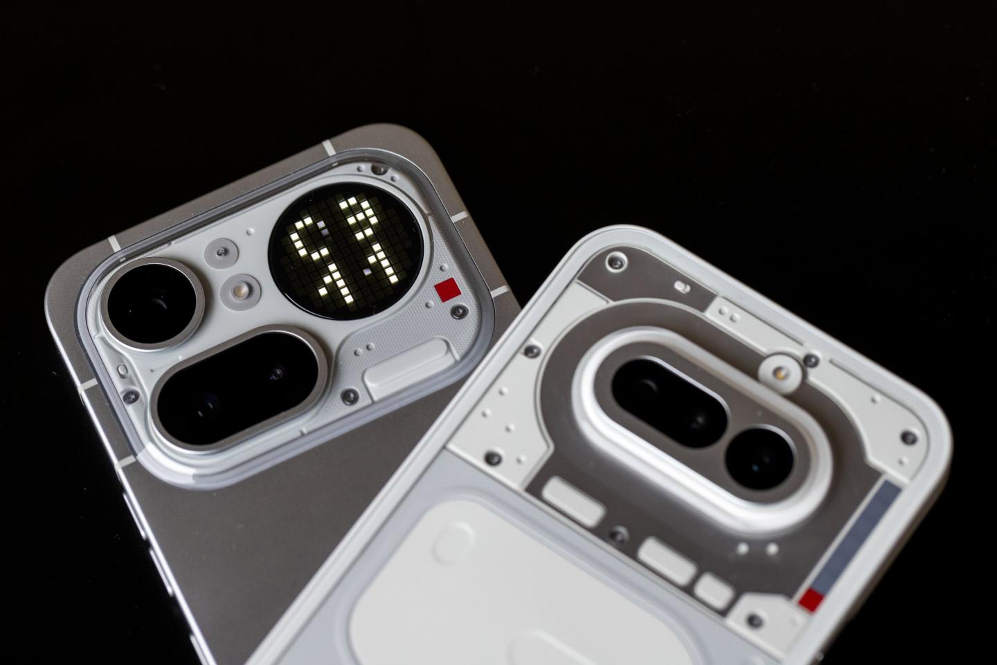 gettyimages-2264454988_2880x1920 A Nothing Phone (4a) Pro, left, and a Nothing Phone (4a)