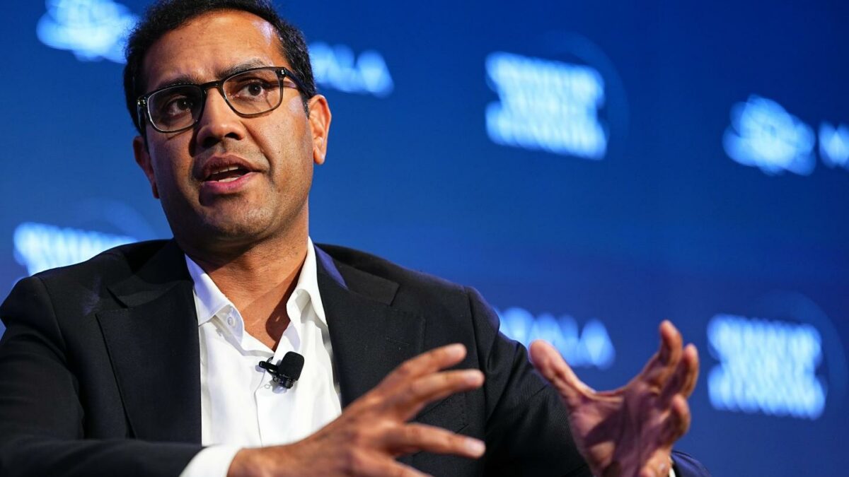 Man in a suit and glasses