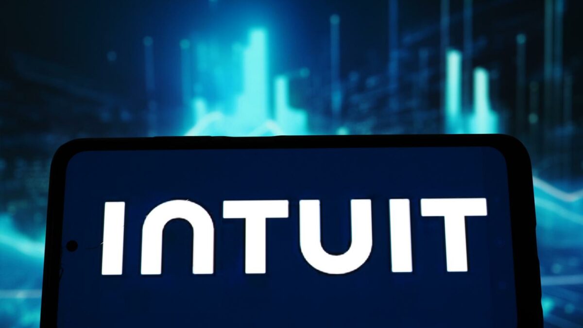 In this photo illustration, an Intuit Inc. logo seen displayed on a smartphone.
