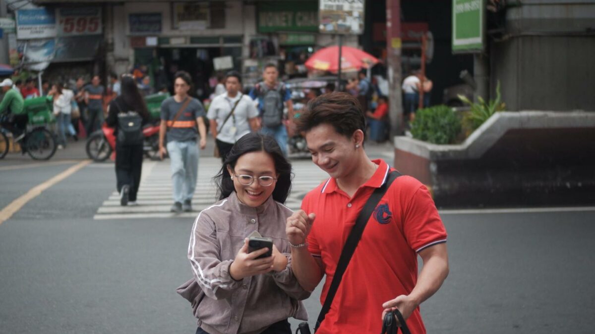 Filipinos walk through Metro Manila's central business district in Quezon City, Philippines, on July 24, 2026, ahead of Philippine President Ferdinand Marcos Jr.'s State of the Nation Address (SONA).