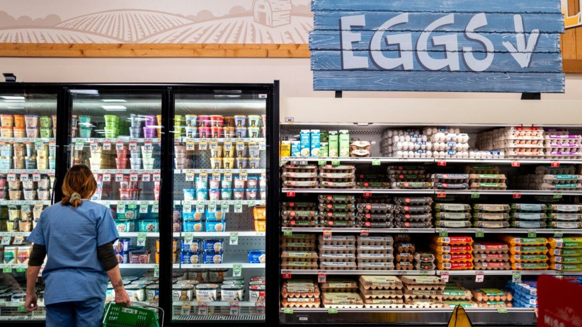 A shopper browses a grocery store in Austin, Texas, amid growing concern over food recalls.