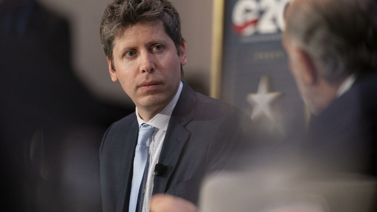 Photo of OpenAI CEO Sam Altman speaking at a G20 meeting.