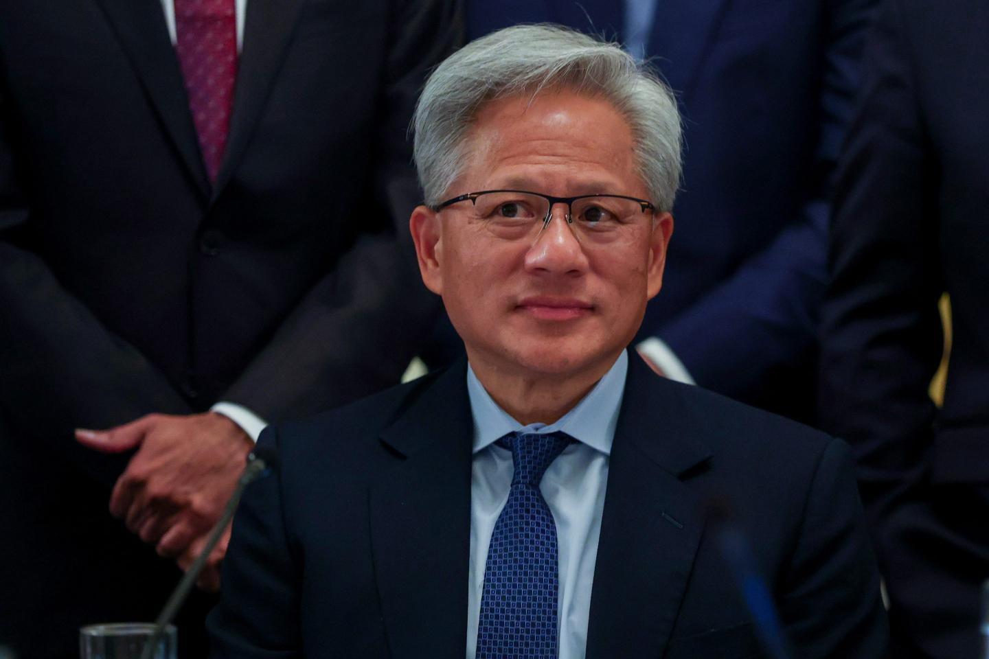 Nvidia CEO Jensen Huang attends a meeting on artificial intelligence in the East Room of the White House.