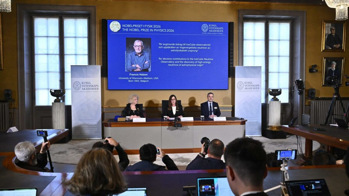 Eva Olsson, Ellen Moons, and Mark Pearce sit in front of a screen displaying Francis Halzen as the recipient of the 2026 Nobel Prize in Physics during a press conference at the Royal Swedish Academy of Sciences in Stockholm, Sweden, on October 6, 2026. Belgian physicist Francis Halzen won the Nobel Prize in Physics for work on subatomic particles at the South Pole, the Nobel jury said.