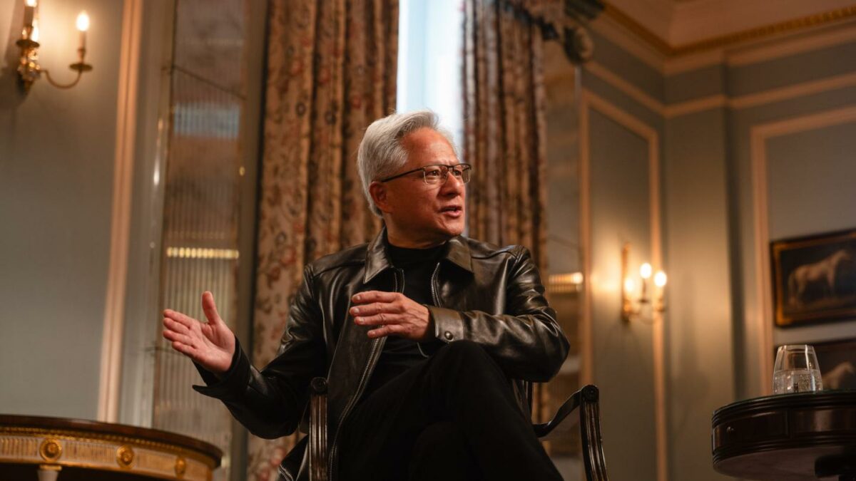 Jensen Huang, CEO of Nvidia, sitting and speaking.