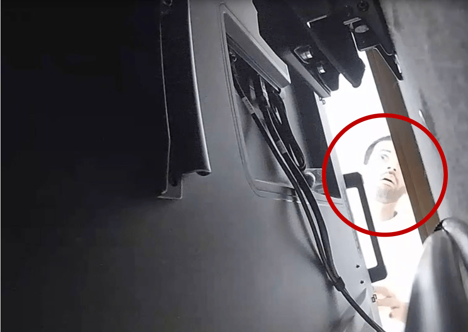 Abdulrahman Alfozan is seen here caught on camera attempting to retrieve the recording device.